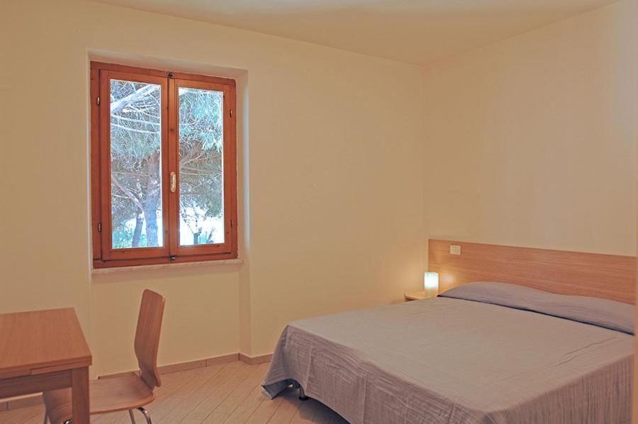 Appartamenti Casa Pineta Marina di Campo Pokoj fotografie